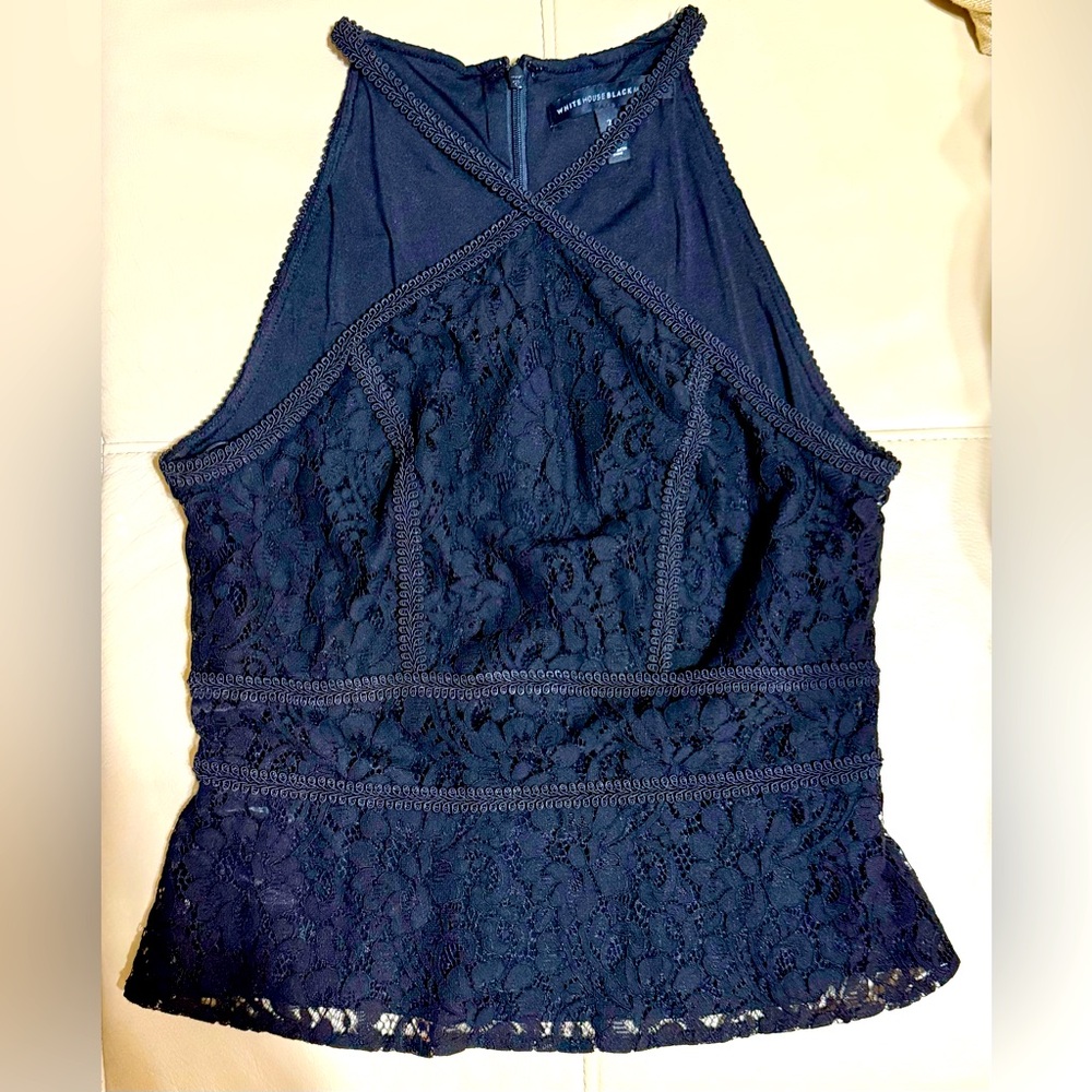 White House Black Market lace embroidered, peplum top. NEW, no tags NEVER WORN.